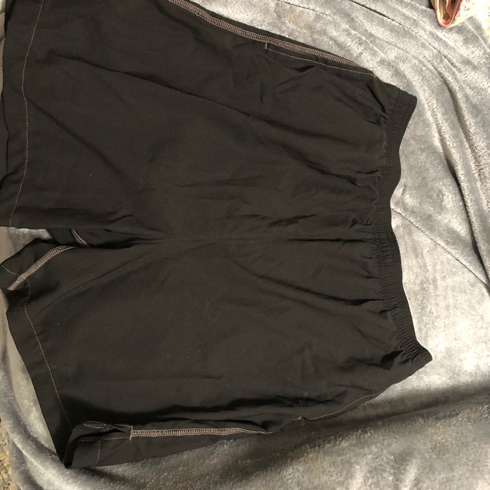 New black Ostomysecrets men’s bathing suit